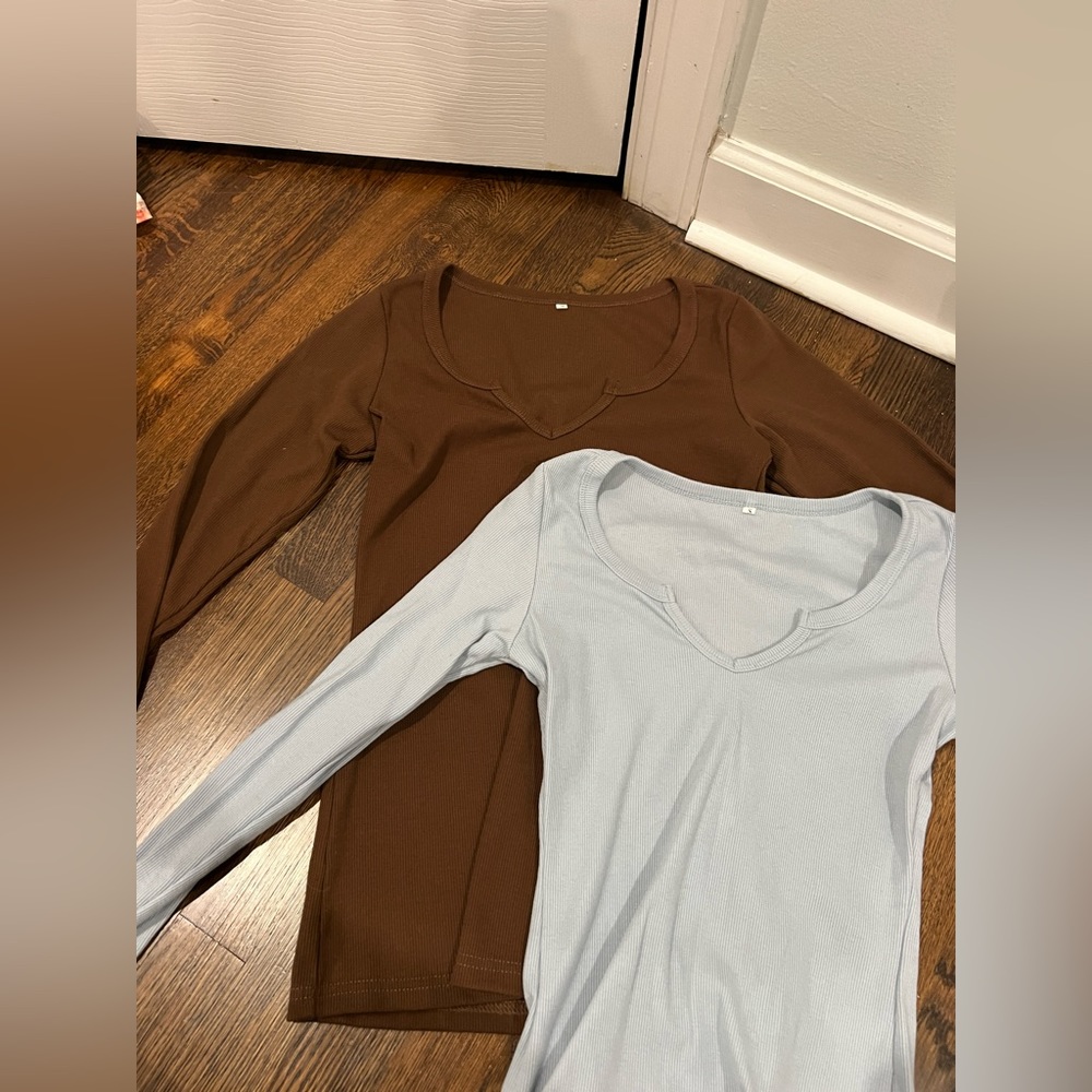 brown and blue long sleeve shirts
